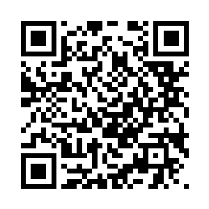 许麒背对着许天狼和宫舜的脸上透露出笑容二维码生成