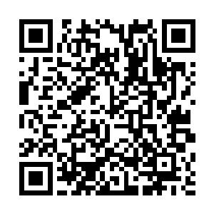 设计得相当精美的圆形标志周围刻着的小字asiapowe二维码生成