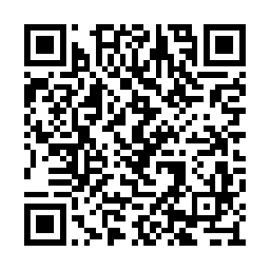 说着老板拿出来了一张照片和一张地图然后说道二维码生成