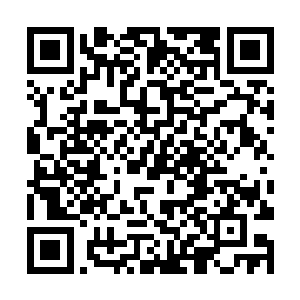 谁都想象不到这里上午还发生过一场那么嚴重的暴动二维码生成