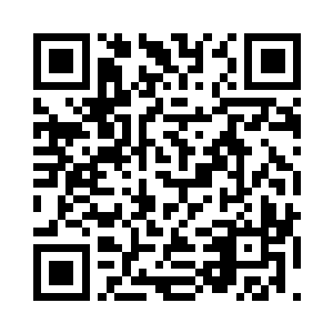 豪华车队逐渐驶进了树林茂密的高坡丘陵地二维码生成