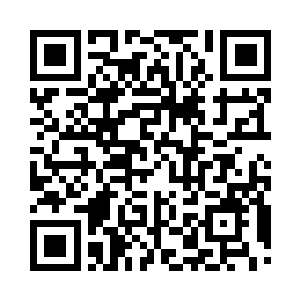 走在路上向他欢笑问好的男女老少是他的族人二维码生成