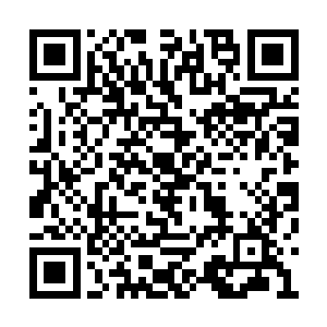 赵长枪忽然对已经再次换好弹夹的王明轻声说道二维码生成