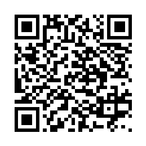 赵长枪握着钱其强的手在给他们送行二维码生成