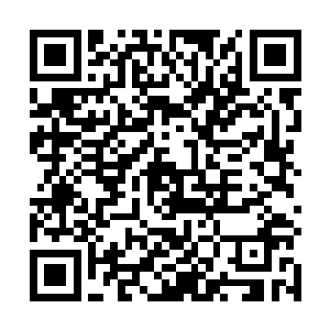 赶忙就把他的那个石匣放到了那绑匪的伤口上面去……二维码生成