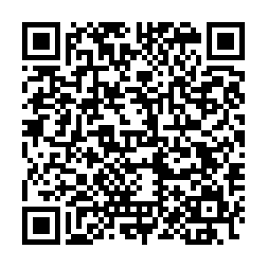 足上是一双名贵稀有的神化九星大圆满魔兽墨玉兽皮精制而成的战地靴二维码生成