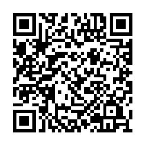 距离芝安一中校门口不到一百米的一栋民居顶层二维码生成