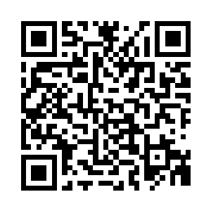 跟在丈夫后面蹲坐的周琳菲不太在意周围景色二维码生成