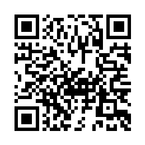 身旁的小桌子上面还放了一个茶杯二维码生成