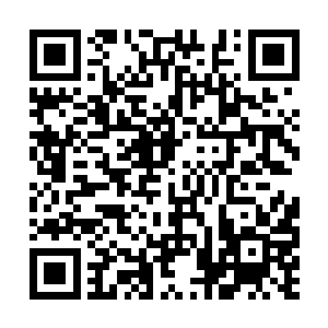 这一次抓到手里的是一块只有指甲大小的黄色晶石二维码生成