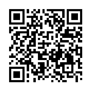 这个专卖店的经理是一个年约三十出头的女子二维码生成