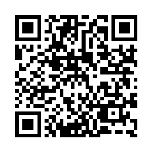 这些人头堆积在石碑周围已经被乱草埋没二维码生成