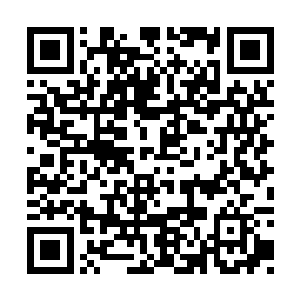 这些升起来的火焰竟然形成了一个巨大的骷髅头二维码生成