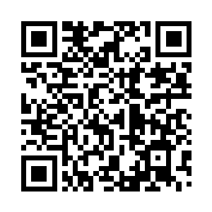 这些建筑多数是用竹子和石块垒起来的二维码生成