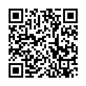 这时坐在这样高档的车上也难免有点拘谨二维码生成