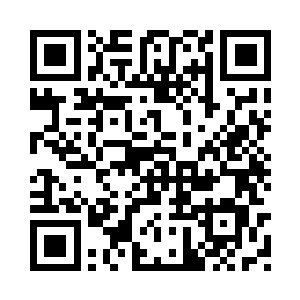 这是办公室之中的投影仪正在投影二维码生成