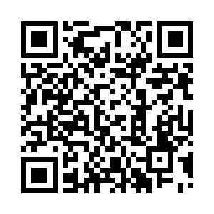 这是当年你母亲送给你父亲做衣服用的二维码生成