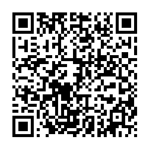 这样可以通过一个电机带动按键以每分钟数千次上万次的速度来按下二维码生成