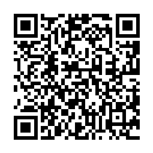 这牒牌上的花纹和细孔是一种非常复杂的机器立体识别码二维码生成