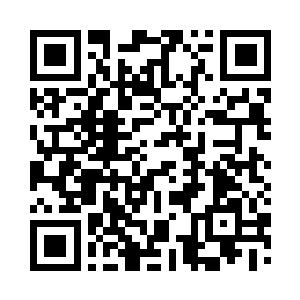 这空间里摆着一张桌子和一个张沙发椅二维码生成