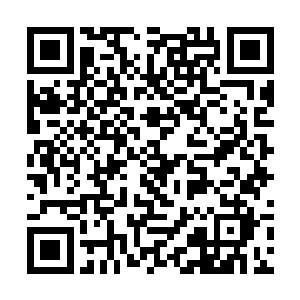 这辆黑色商务车悄然向北宁市火车站的方向赤城而去二维码生成