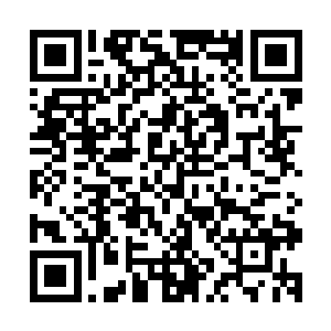 远远就能望见那矗立在边境线上高大建筑物顶端飘扬的红旗了二维码生成