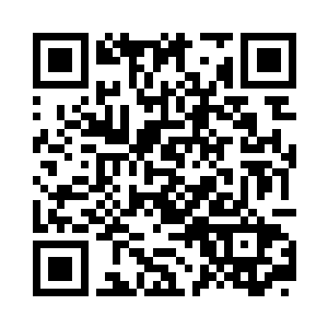 递给了眼前戴着厚底眼镜一身朴素行头的青年二维码生成