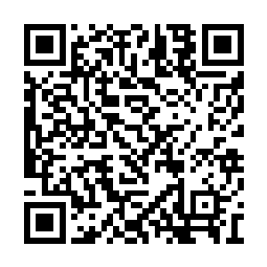 通过斜坡推到寨墙上的弩机传来一片上弦的声音二维码生成