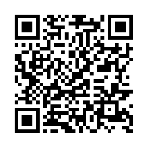 那个妇人的脸上出现了一个看透一切的笑容二维码生成