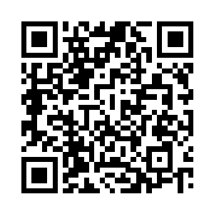 那个老师这时候拎起了两本书走出了办公室二维码生成