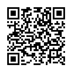 那些扛着箱子的黑衣人快速把箱子放到地上二维码生成