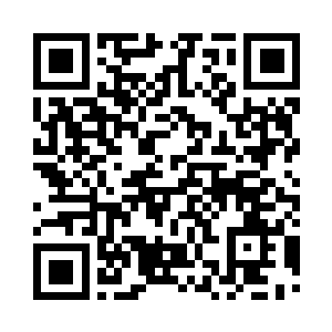 那儿正有一名十分瘦弱的青年坐在里边二维码生成