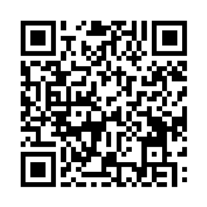 那大城的城墙是一种黑色巨石堆砌而成二维码生成