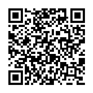 那淡淡的光芒就是从这漆黑宝石之上散发出来的二维码生成