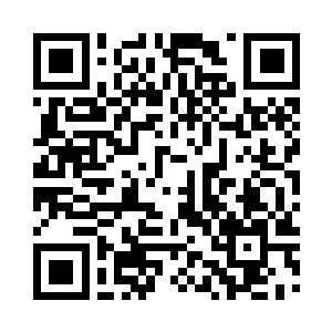 那男子将背后携带的一大堆东西放到贡献台上二维码生成