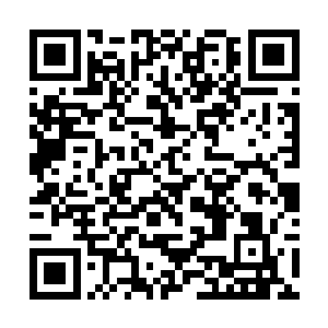 那道粗若巨柱的能量束向着街道旁的建筑群冲扫而去二维码生成