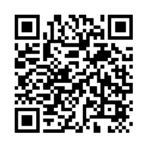 里面摆设着一些用石头雕刻成的装饰品二维码生成