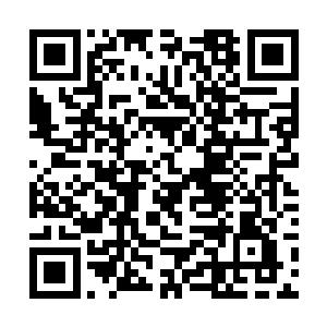 重新换了一套军官制服的张铁离开了格林夫妇的住所二维码生成