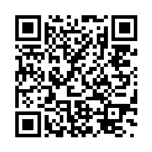 金牙老大又从怀里摸出一枚圆圆的镜片二维码生成