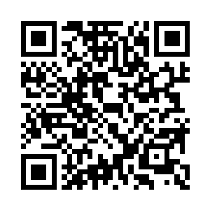 铺满无尽灰尘的地板以及到处胡乱摆放的书籍二维码生成