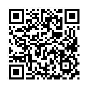 镜头通过电话机的话筒转到了尼奥的情节上二维码生成