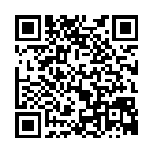 闷不做声的把手边长长的一条弹链全部打完二维码生成