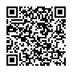 阔鼻大口的阿卜迪大叔看起来已经肯定过了五十岁二维码生成