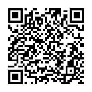 陈彬那犹如一段黑色瀑布倒挂空中的发型简直就像一个路标一样二维码生成