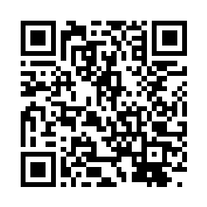 除了面对门口的一张原木色桌子和椅子之外二维码生成