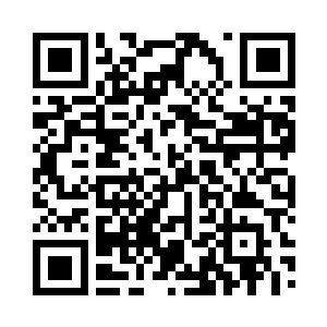 随即手忙脚乱地抓起车上的车载通讯器二维码生成