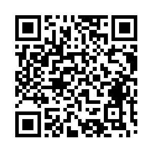 随后走向了这城区里稍微大的一间办公厅二维码生成