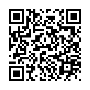 露出刚刚萌芽还没有完全长成的牙齿二维码生成