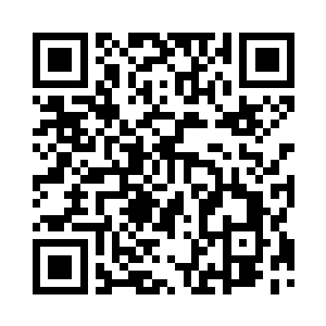 顾平安捧着电脑和他做网上的兴趣题二维码生成