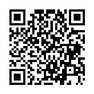 黝黑的石块和鬼影般的树木交织在了一块二维码生成